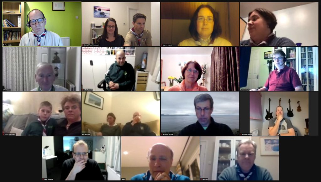 A screenshot of an online meeting of people gathered.