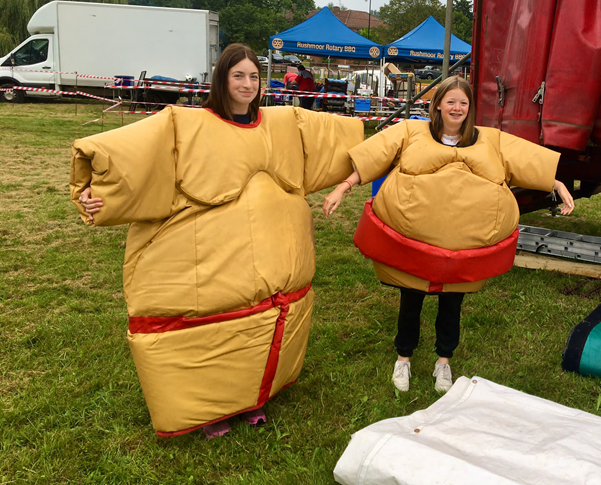 Hartley Wintney Scouts dressed in sumo suits.