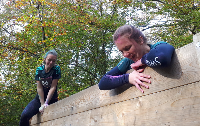 Two female Scouts taking part in the Mud run.